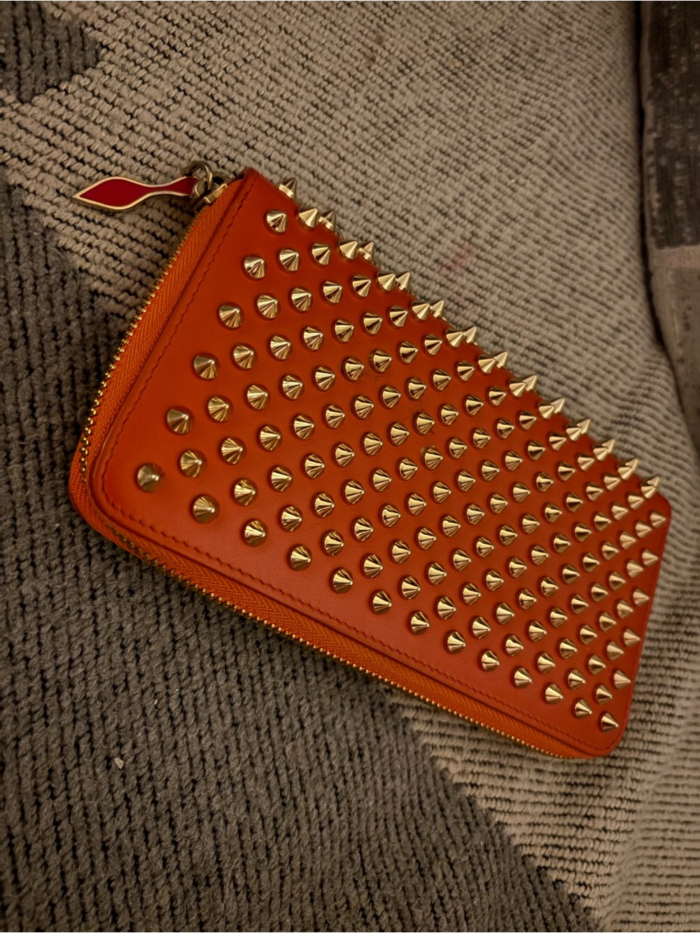 Christian Louboutin Orange Spike Zip wallet